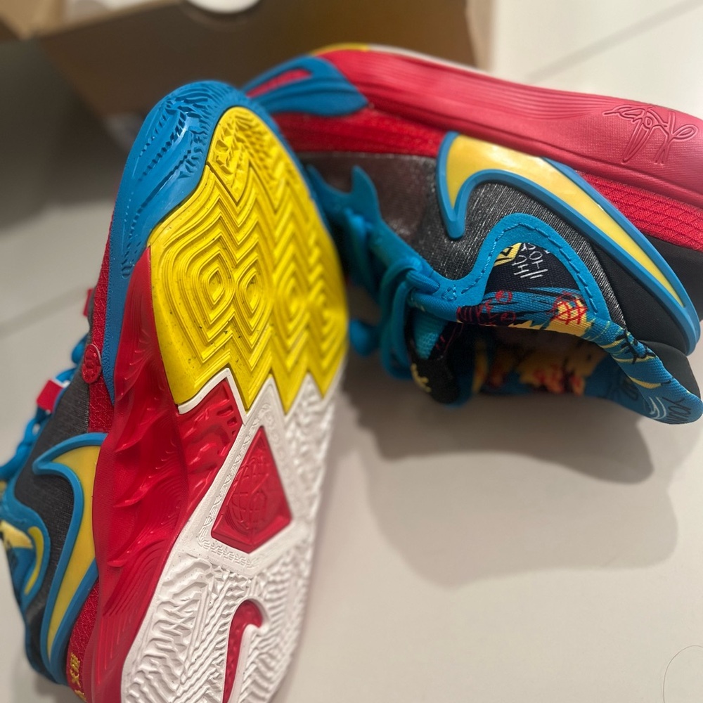 Nike Kids Sneakers in Vibrant Red, Blue, and Yellow